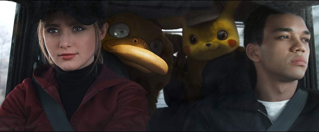 Ryan Reynolds, Kathryn Newton, and Justice Smith en Pokémon Detective Pikachu (2019)